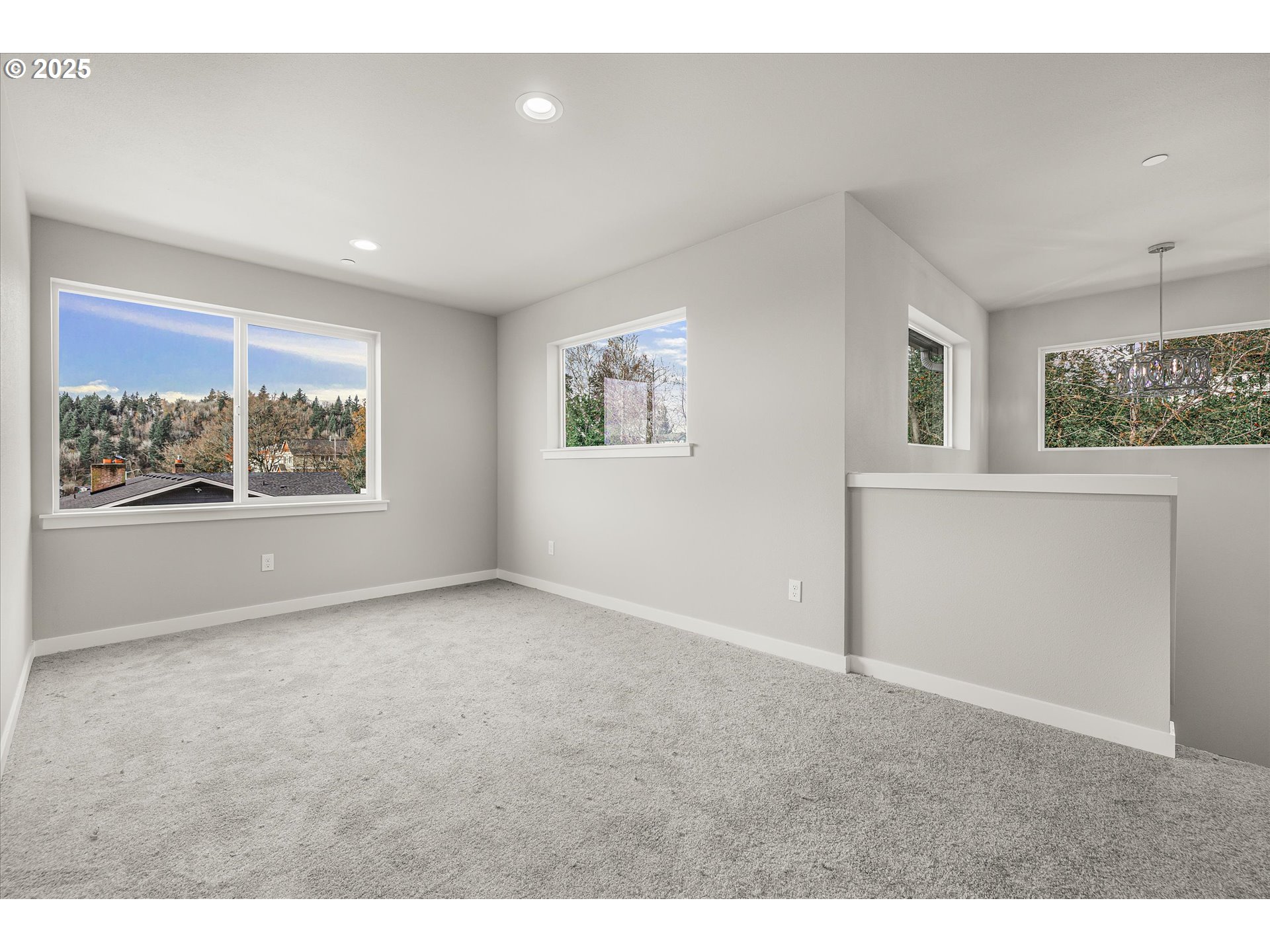 296 Southwest Mawrcrest Avenue Gresham, OR 97030 - Photo 21 of 35 a view of an empty room with a window