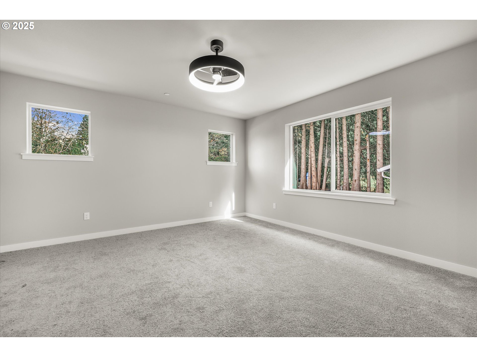 296 Southwest Mawrcrest Avenue Gresham, OR 97030 - Photo 22 of 35 a view of an empty room with a window
