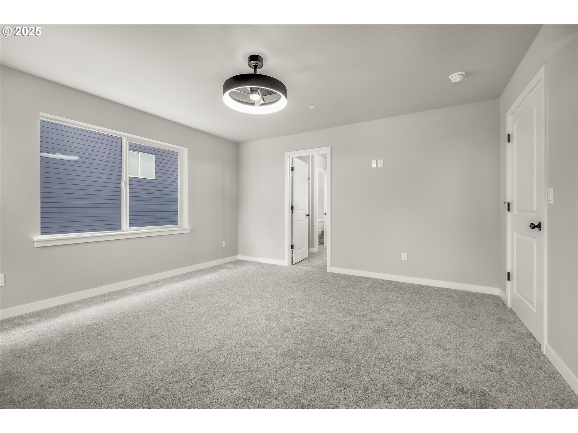296 Southwest Mawrcrest Avenue Gresham, OR 97030 - Photo 23 of 35 a view of an empty room with a window