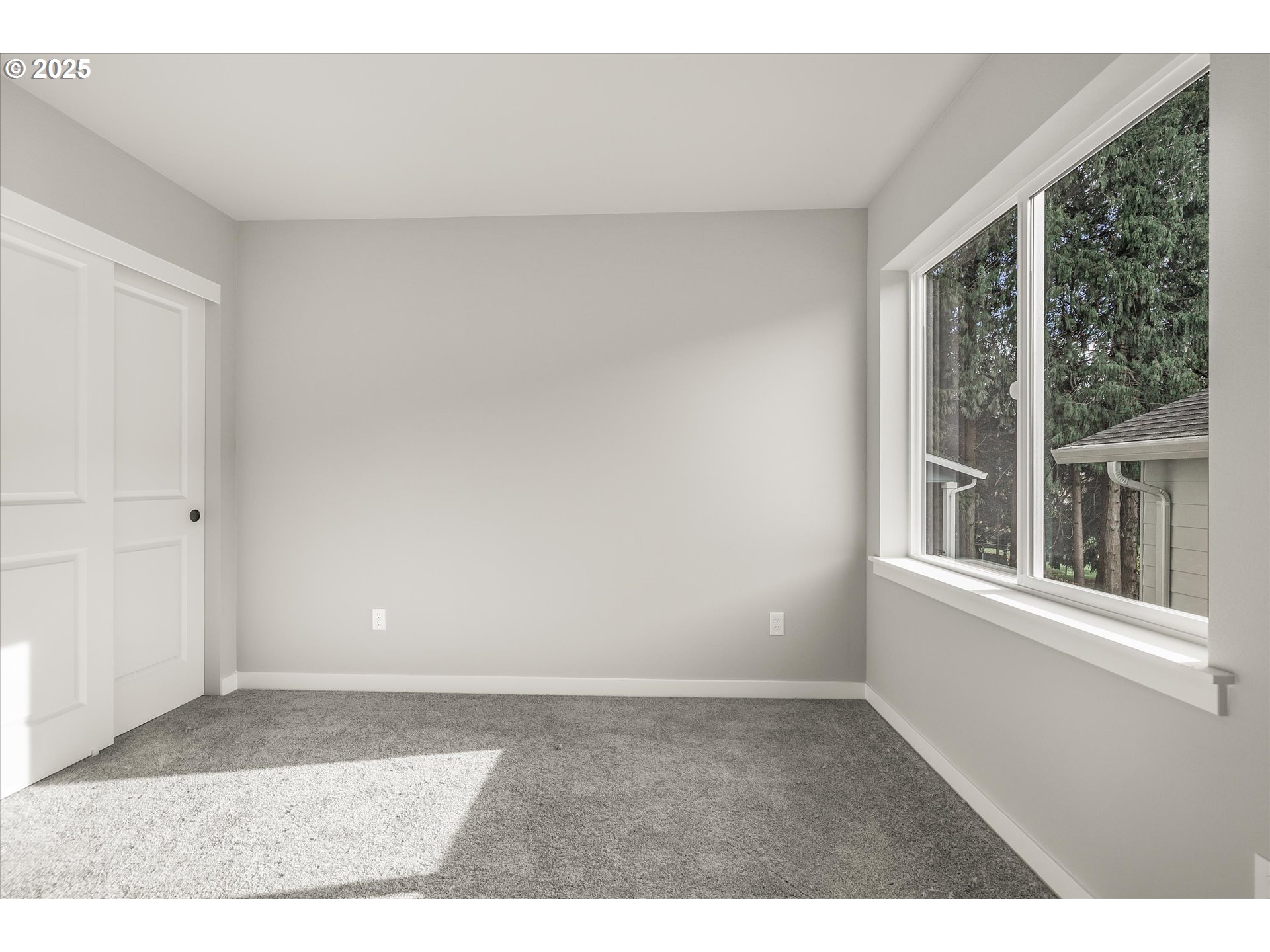 296 Southwest Mawrcrest Avenue Gresham, OR 97030 - Photo 31 of 35 a view of an empty room with a window