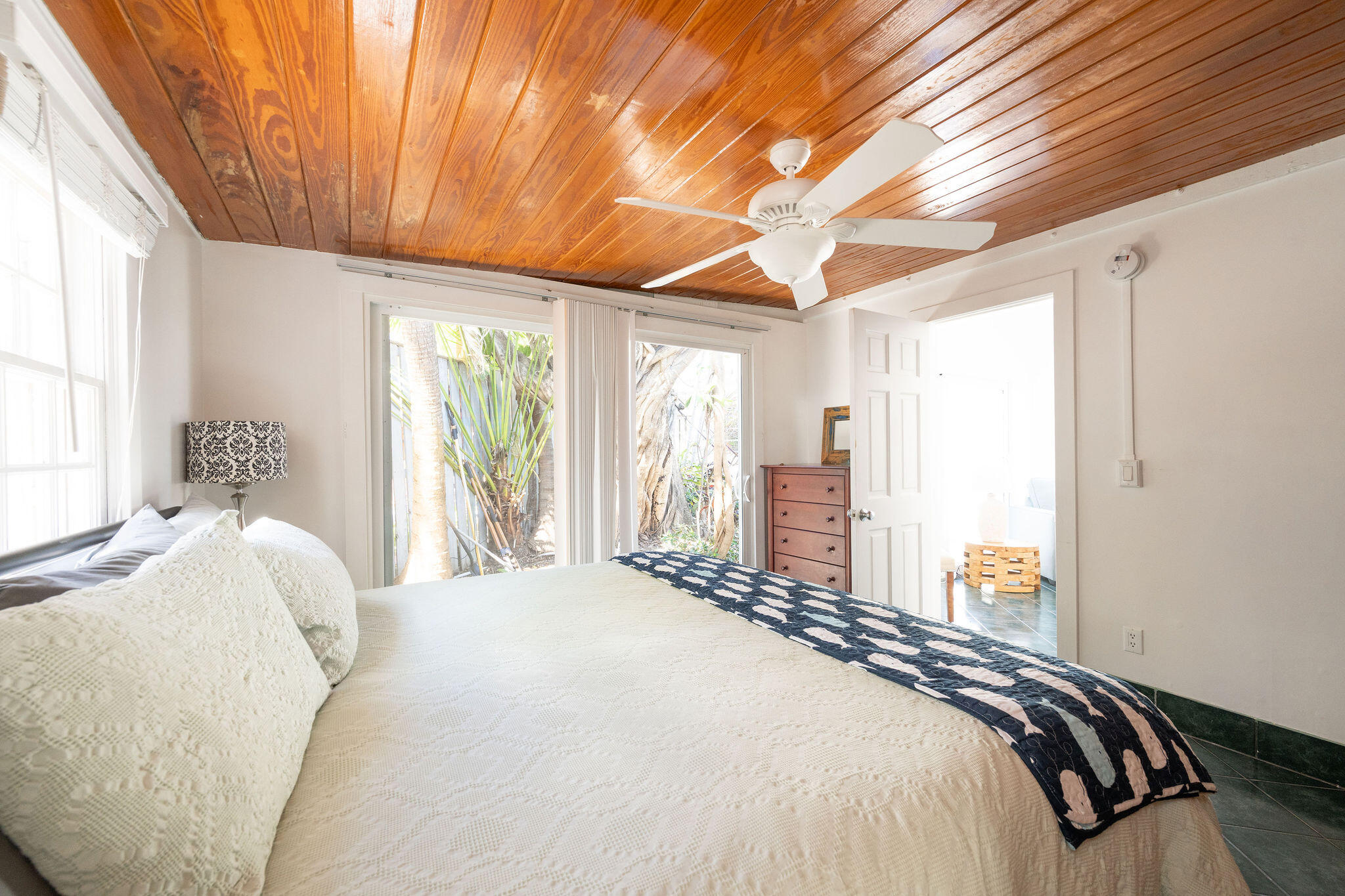 912 James Street, Unit 2 Key West, FL 33040 - Photo 11 of 25 a bedroom with a large bed and a large window