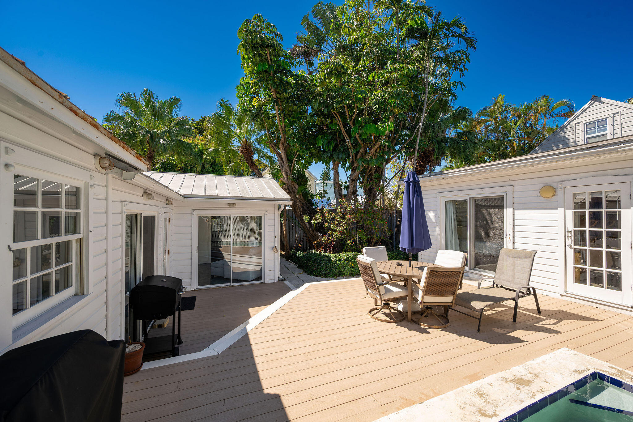 912 James Street, Unit 2 Key West, FL 33040 - Photo 7 of 25 a view of a house with backyard and sitting area