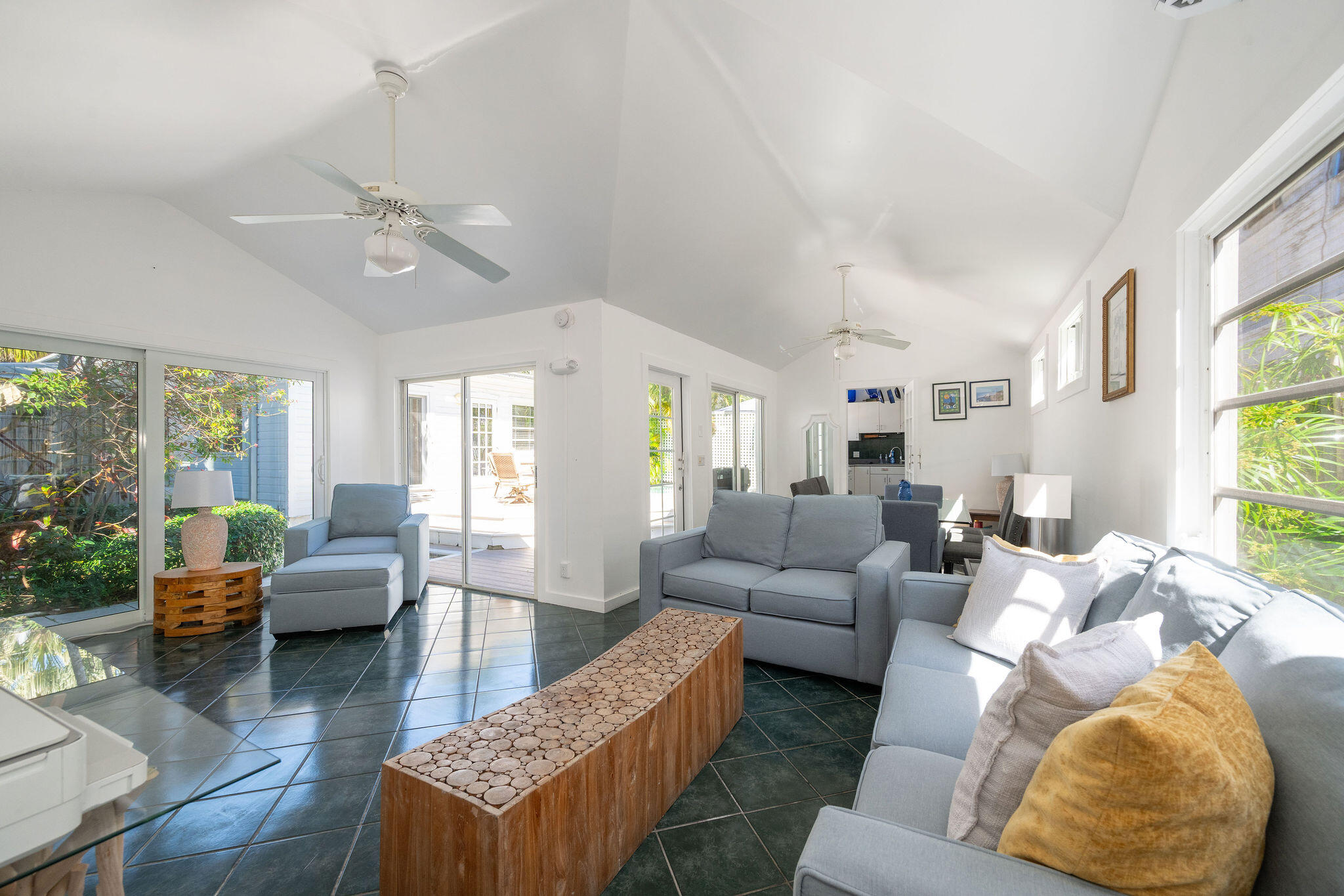 912 James Street, Unit 2 Key West, FL 33040 - Photo 8 of 25 a living room with furniture and a large window