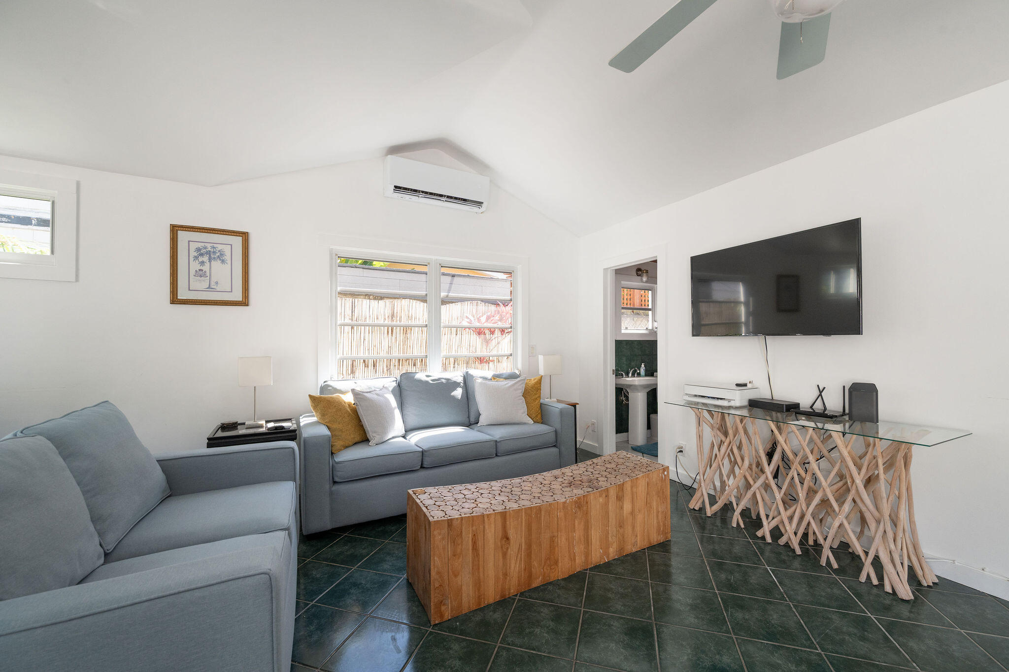 912 James Street, Unit 2 Key West, FL 33040 - Photo 9 of 25 a living room with furniture and a flat screen tv