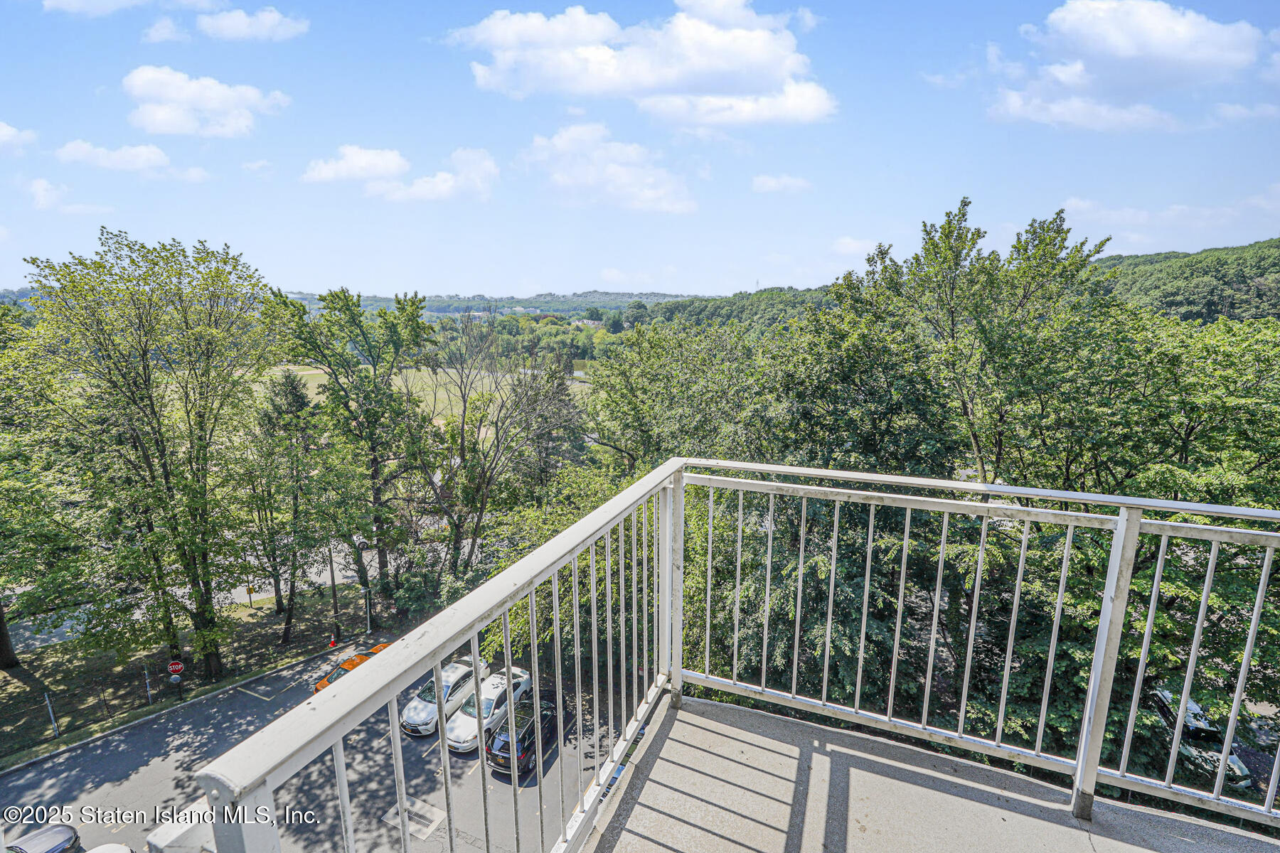 1100 Clove Road, Unit 60 Staten Island, NY 10301 - Photo 11 of 25 a balcony with an outdoor space