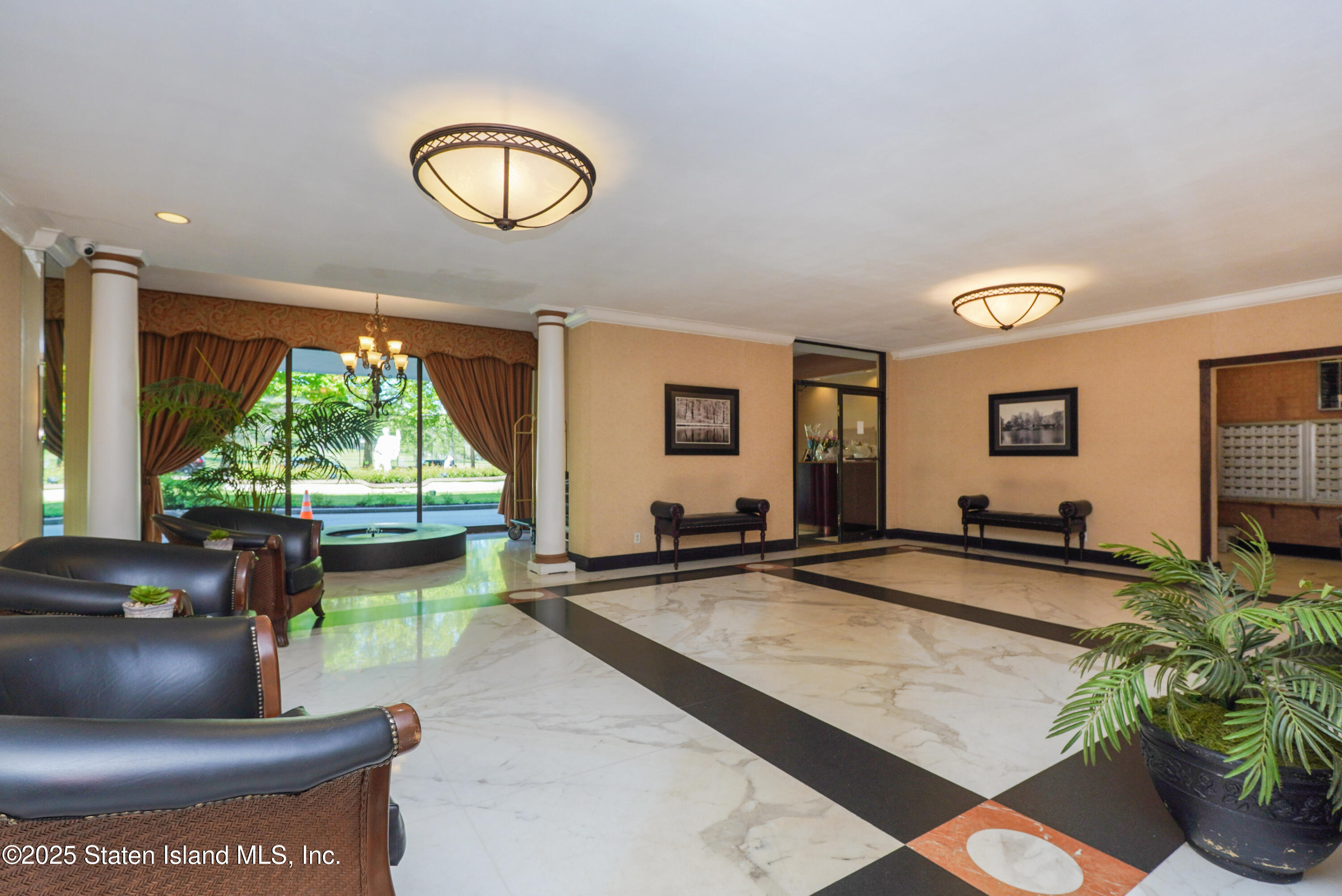 1100 Clove Road, Unit 60 Staten Island, NY 10301 - Photo 2 of 25 a view of a living room and window