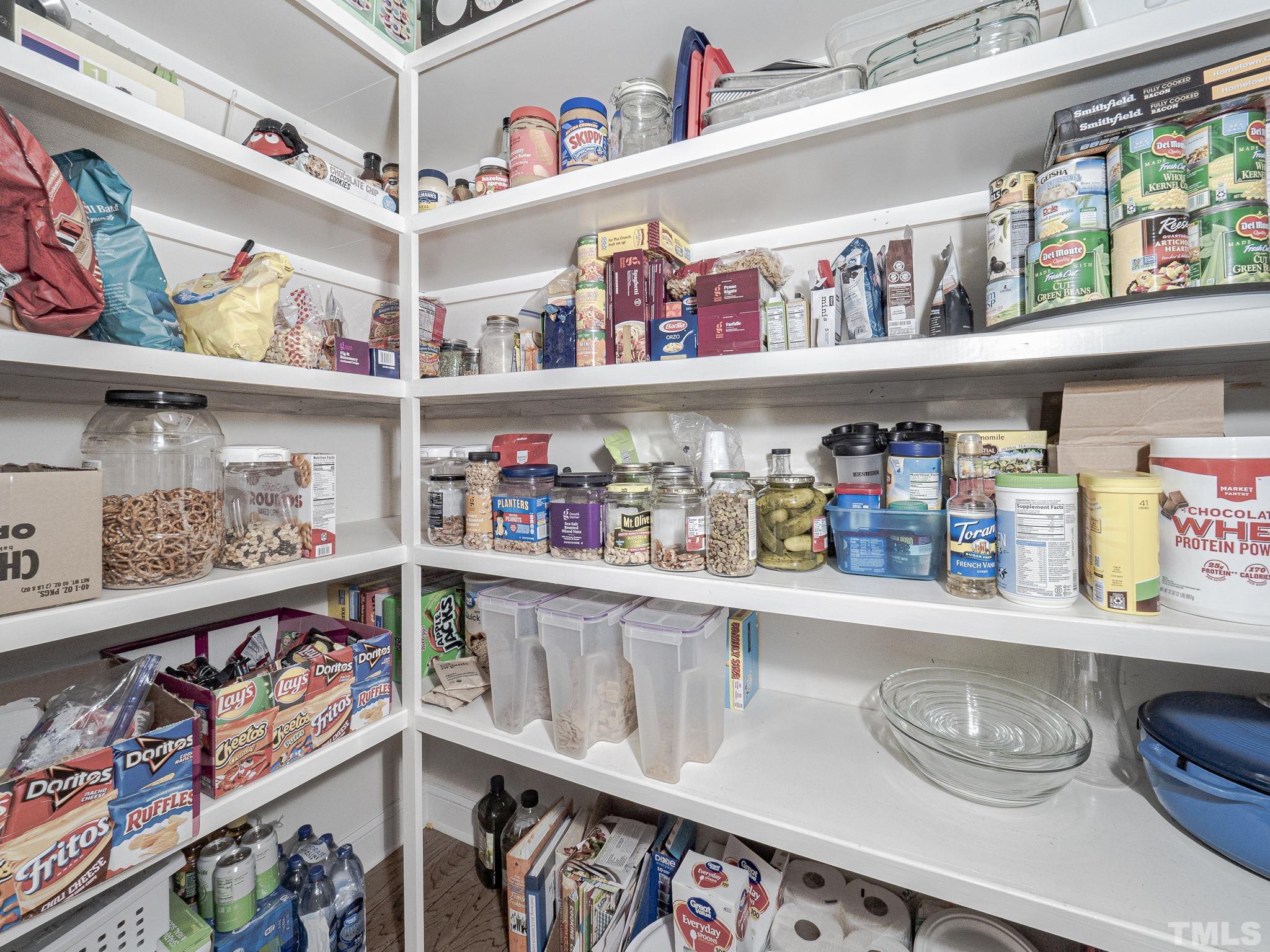 1990 Mostyn Lane Apex, NC 27502 - Photo 18 of 41 a cabinet with shelves