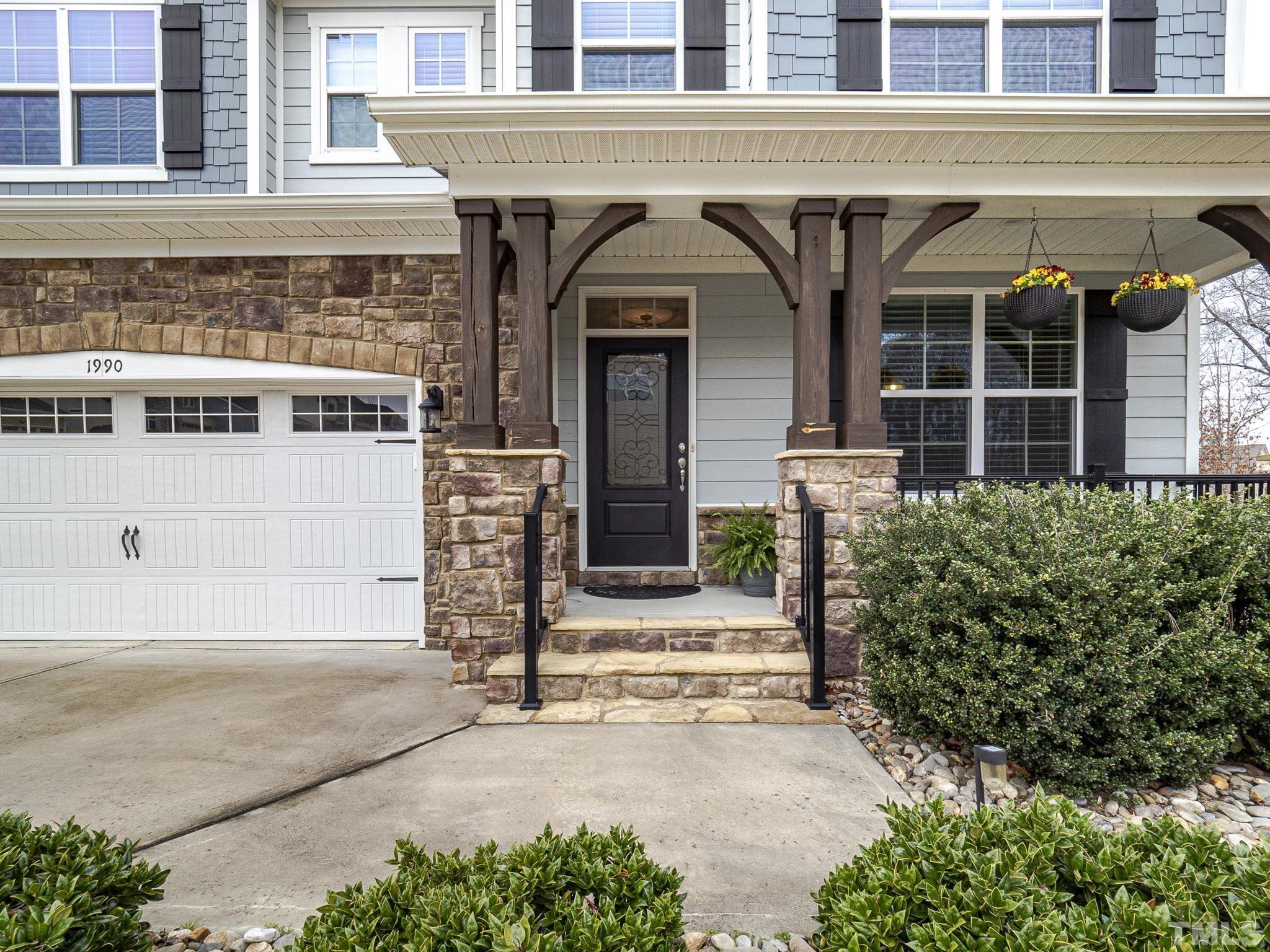 1990 Mostyn Lane Apex, NC 27502 - Photo 3 of 41 front view of a building