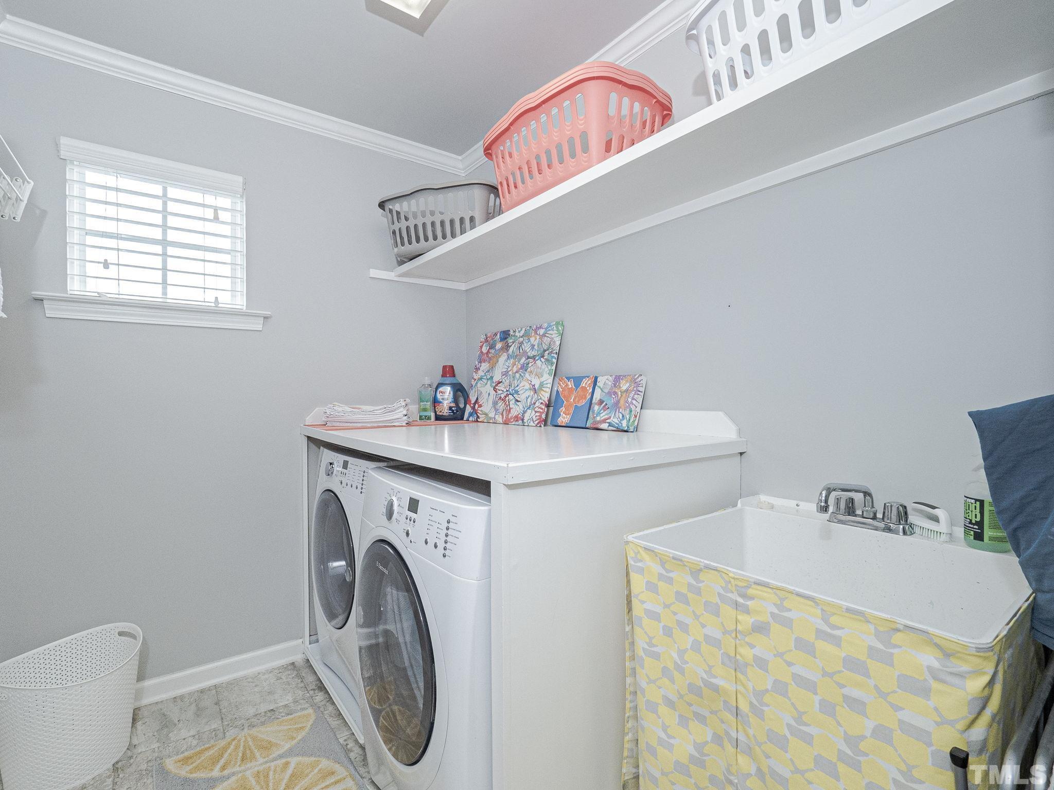 1990 Mostyn Lane Apex, NC 27502 - Photo 35 of 41 a utility room with dryer and washer