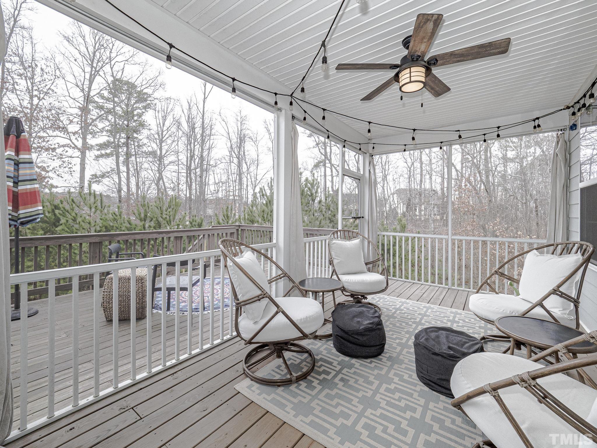 1990 Mostyn Lane Apex, NC 27502 - Photo 37 of 41 a living room with furniture and a floor to ceiling window