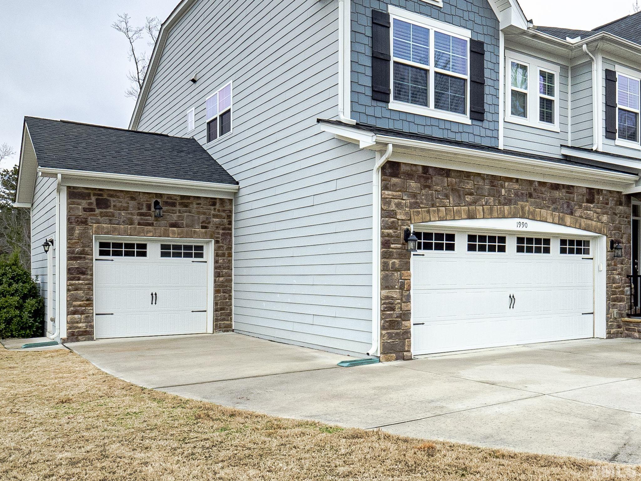1990 Mostyn Lane Apex, NC 27502 - Photo 39 of 41 a front view of a house with a garage