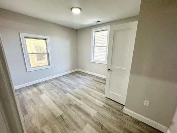 an empty room with windows
