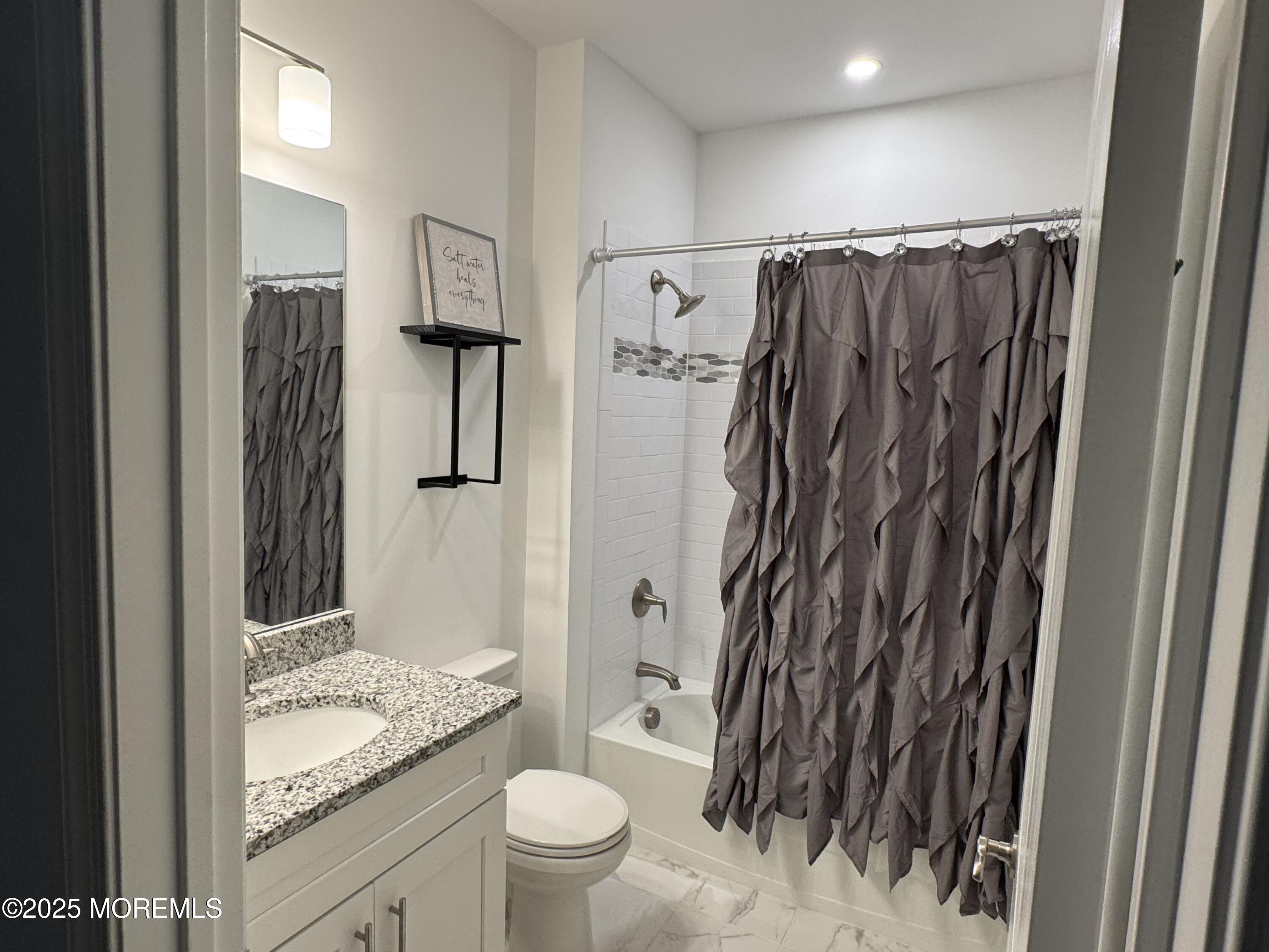 208 Revival Road Brick, NJ 08723 - Photo 9 of 24 208 Revival full bath with tub