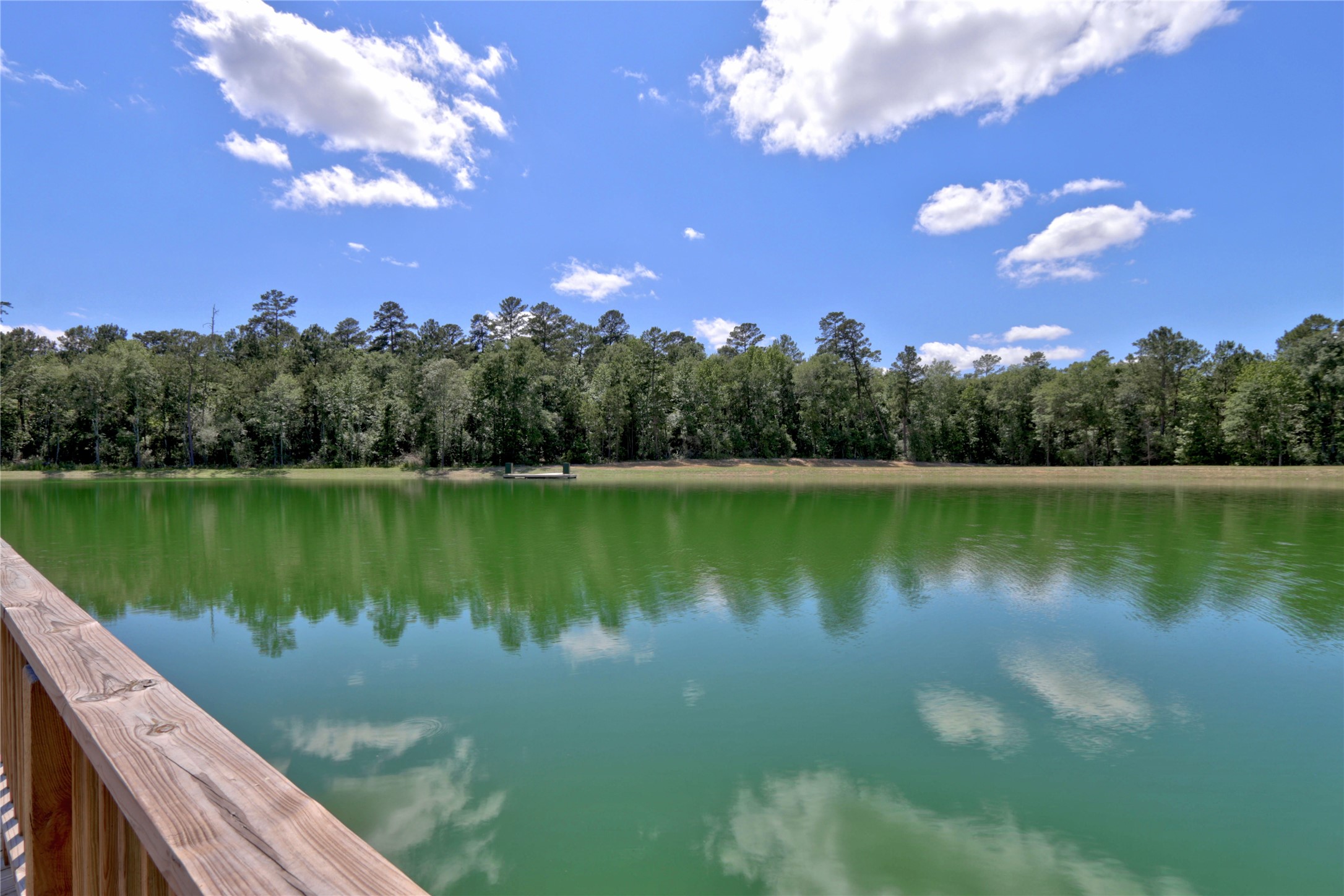 258 Heartland Road New Waverly, TX 77358 - Photo 24 of 27 Beautiful view of Pond from Dock