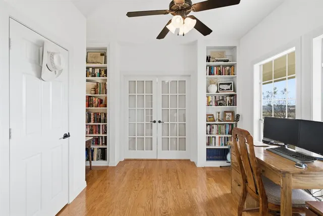 a view of a livingroom with furniture and cabinet