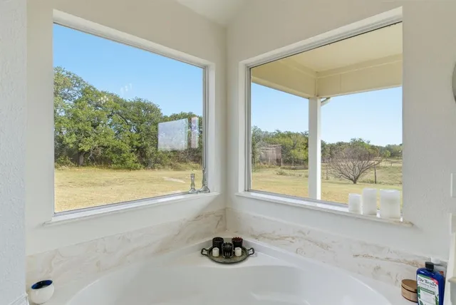 a view of an empty room and window