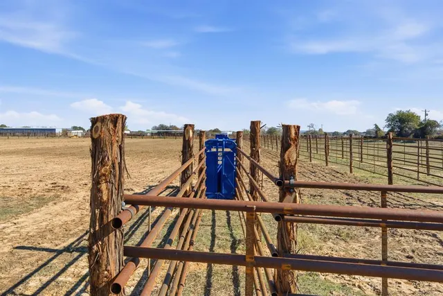 a view of a balcony with an ocean