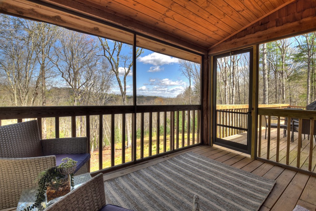 1276 Timber Lake Road Blue Ridge, GA 30513 - Photo 11 of 50 a view of two chairs in the balcony