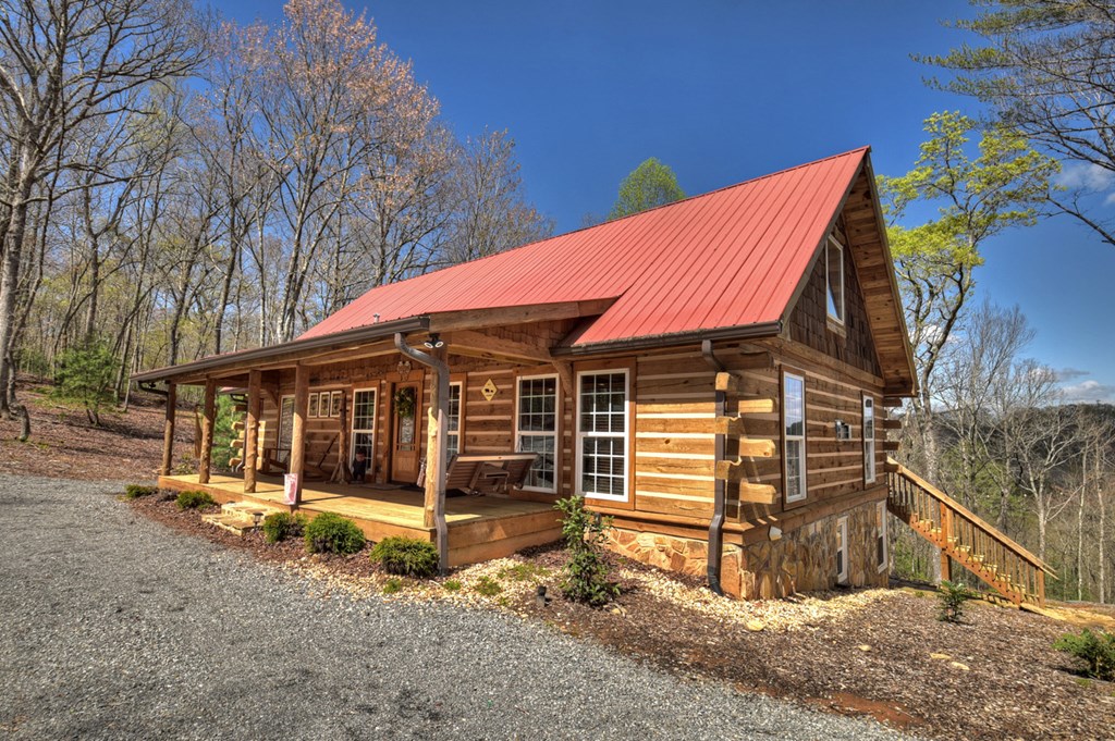 1276 Timber Lake Road Blue Ridge, GA 30513 - Photo 3 of 50 a view of a house with a yard