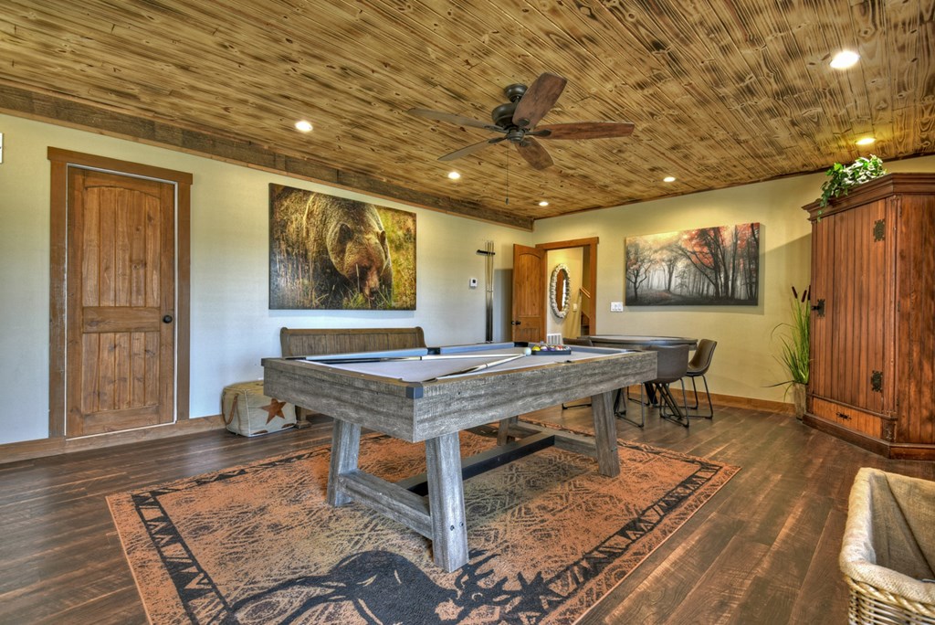 1276 Timber Lake Road Blue Ridge, GA 30513 - Photo 43 of 50 a room with table chairs and wooden floor