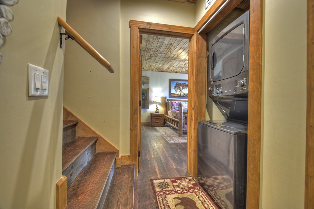 1276 Timber Lake Road Blue Ridge, GA 30513 - Photo 47 of 50 a view of a hallway with wooden floor windows and a livingroom