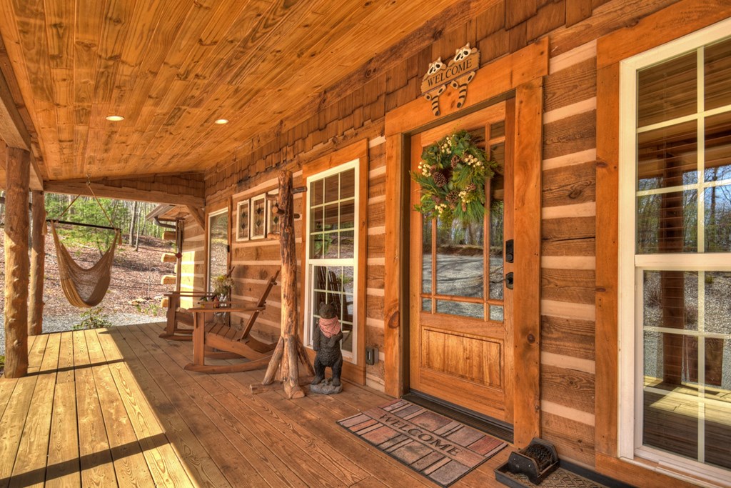1276 Timber Lake Road Blue Ridge, GA 30513 - Photo 7 of 50 a view of entryway with wooden floor and living room