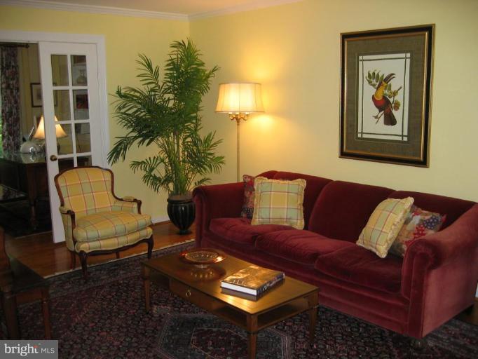 909 Riva Ridge Drive Great Falls, VA 22066 - Photo 9 of 24 Living room leading into an office or library