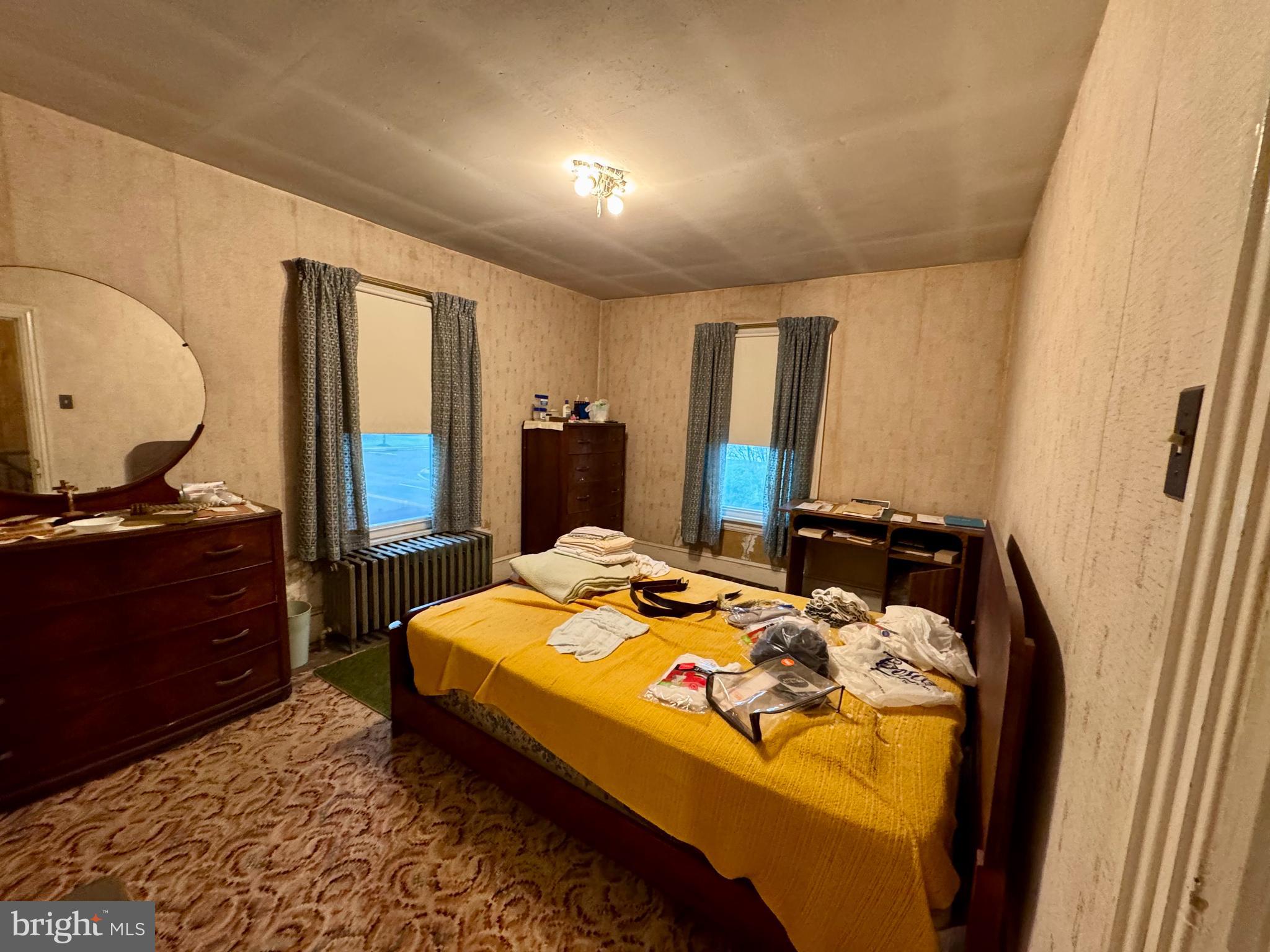 60 Hartford Road Delran, NJ 08075 - Photo 13 of 16 a bed room with a bed and a mirror