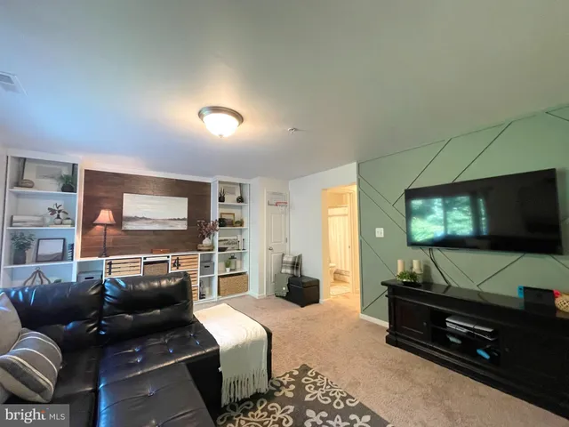 a bathroom with a tub and a shower