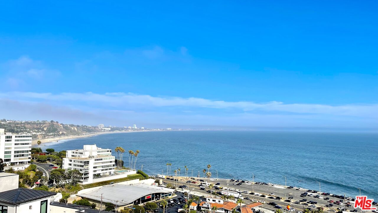 a view of ocean and city