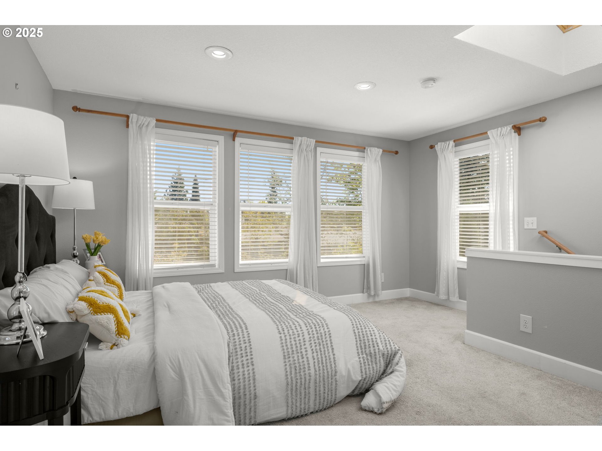 13120 Southwest Rita Drive Beaverton, OR 97005 - Photo 8 of 27 a bedroom with a bed and a window