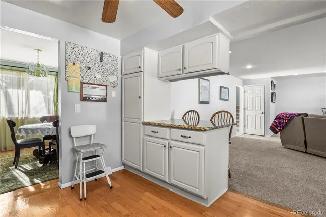 a view of a workspace with furniture