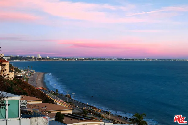 a view of a city with sunset view