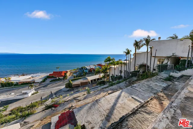 a view of a city with ocean view