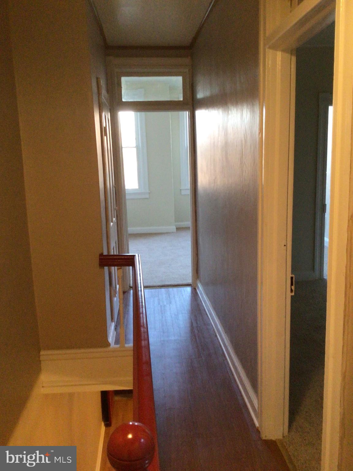 1615 Ramsay Street Baltimore, MD 21223 - Photo 21 of 44 Hardwood floors in hallway