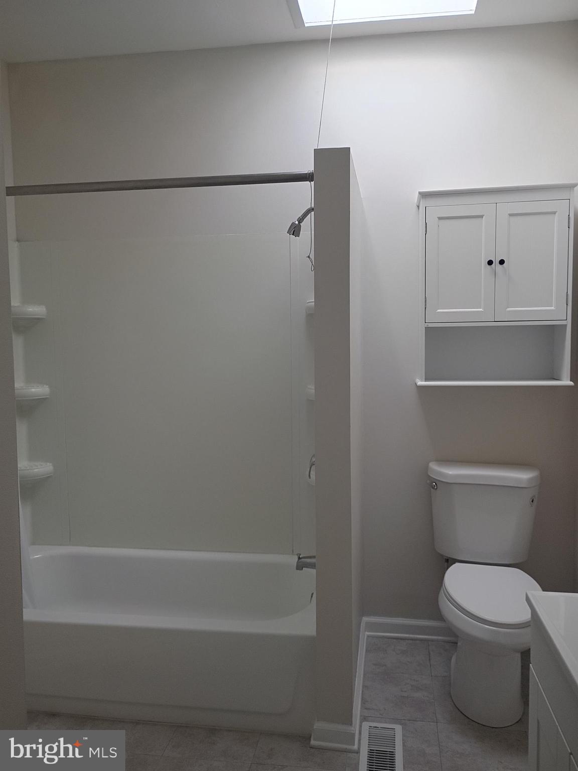 1615 Ramsay Street Baltimore, MD 21223 - Photo 24 of 44 Large, six shelved shower tub w/ cabinetry