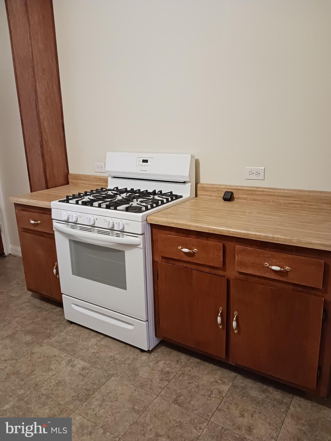 1615 Ramsay Street Baltimore, MD 21223 - Photo 39 of 44 Wood cabinetry & New Stove