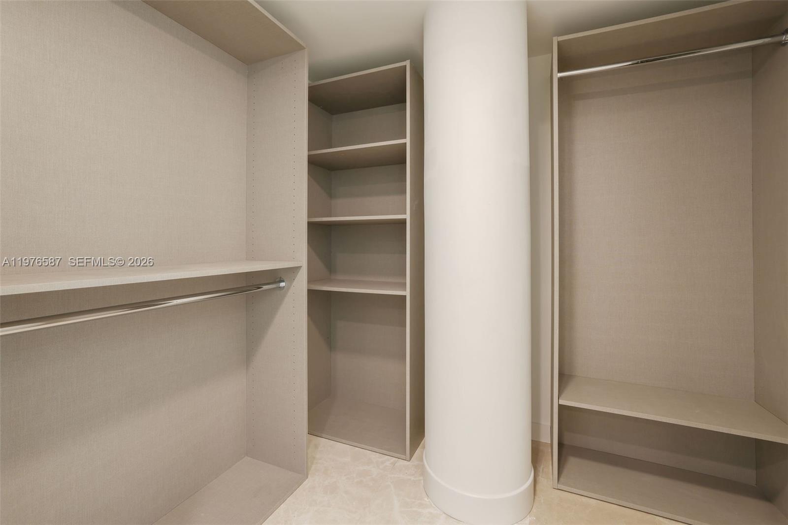 1500 Bay Road, Unit N0516 Miami Beach, FL 33139 - Photo 37 of 88 a view of walk in closet with empty racks