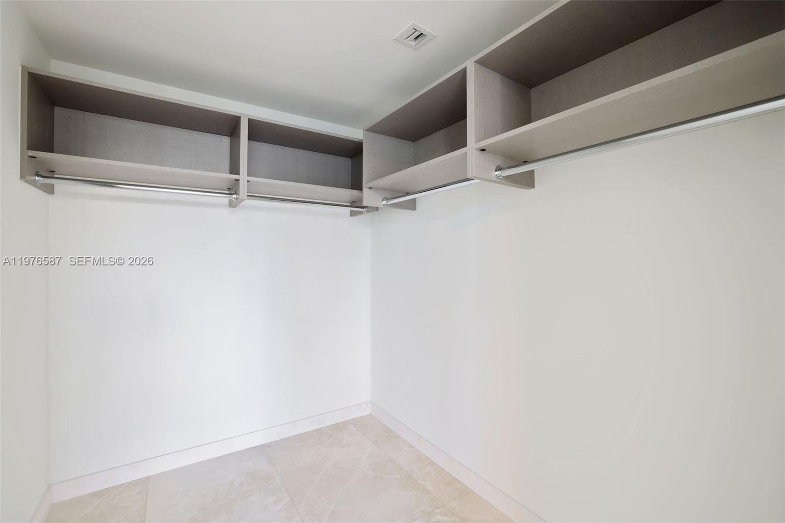 1500 Bay Road, Unit N0516 Miami Beach, FL 33139 - Photo 42 of 88 a view of an empty walk in closet