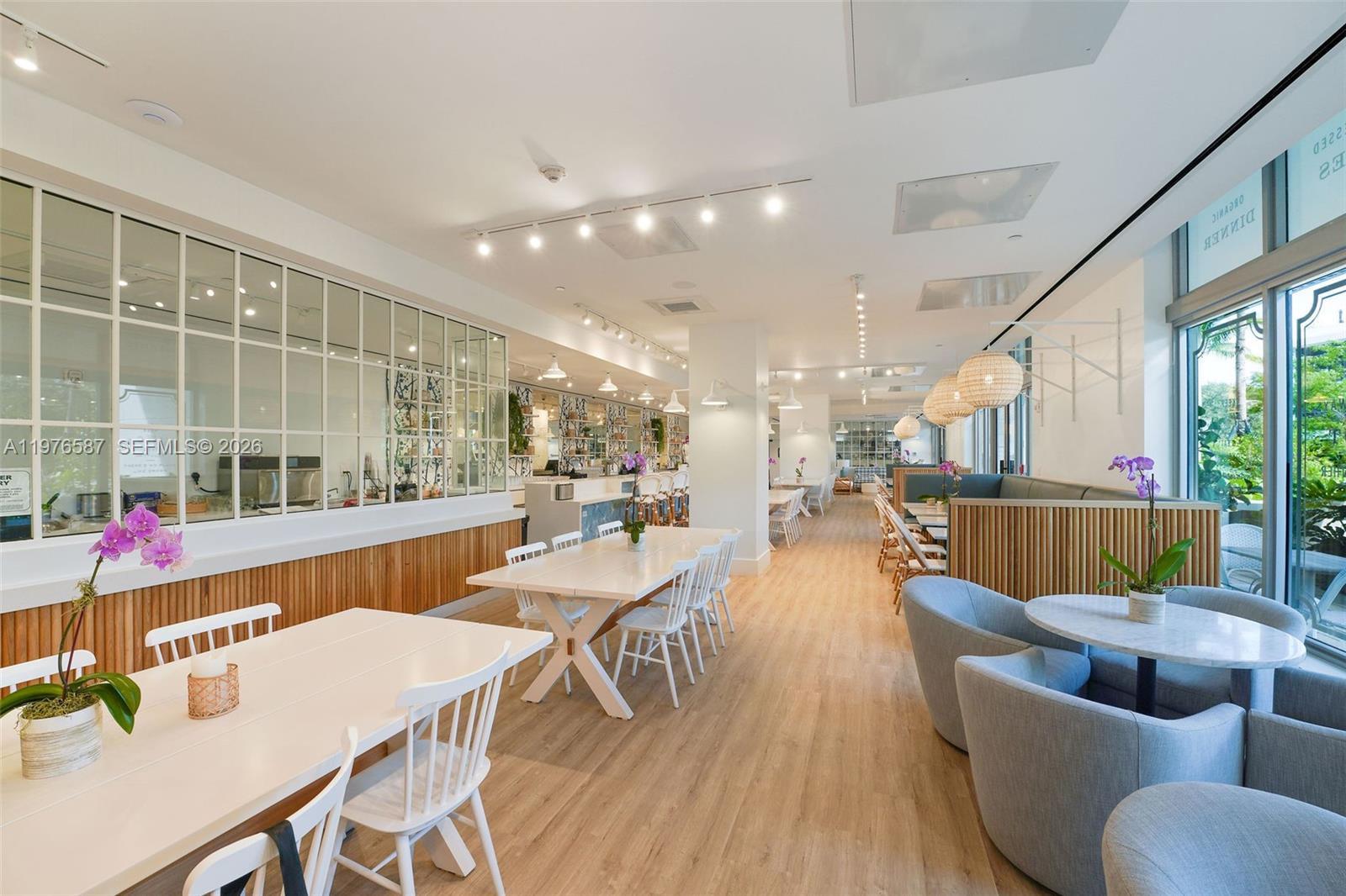 1500 Bay Road, Unit N0516 Miami Beach, FL 33139 - Photo 79 of 88 a dining room with furniture and a table