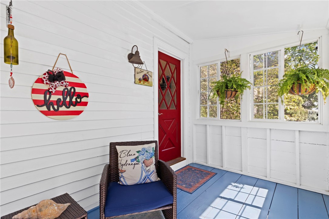 422 N Road Scituate, RI 02831 - Photo 37 of 50 Enclosed porch at the back of the house