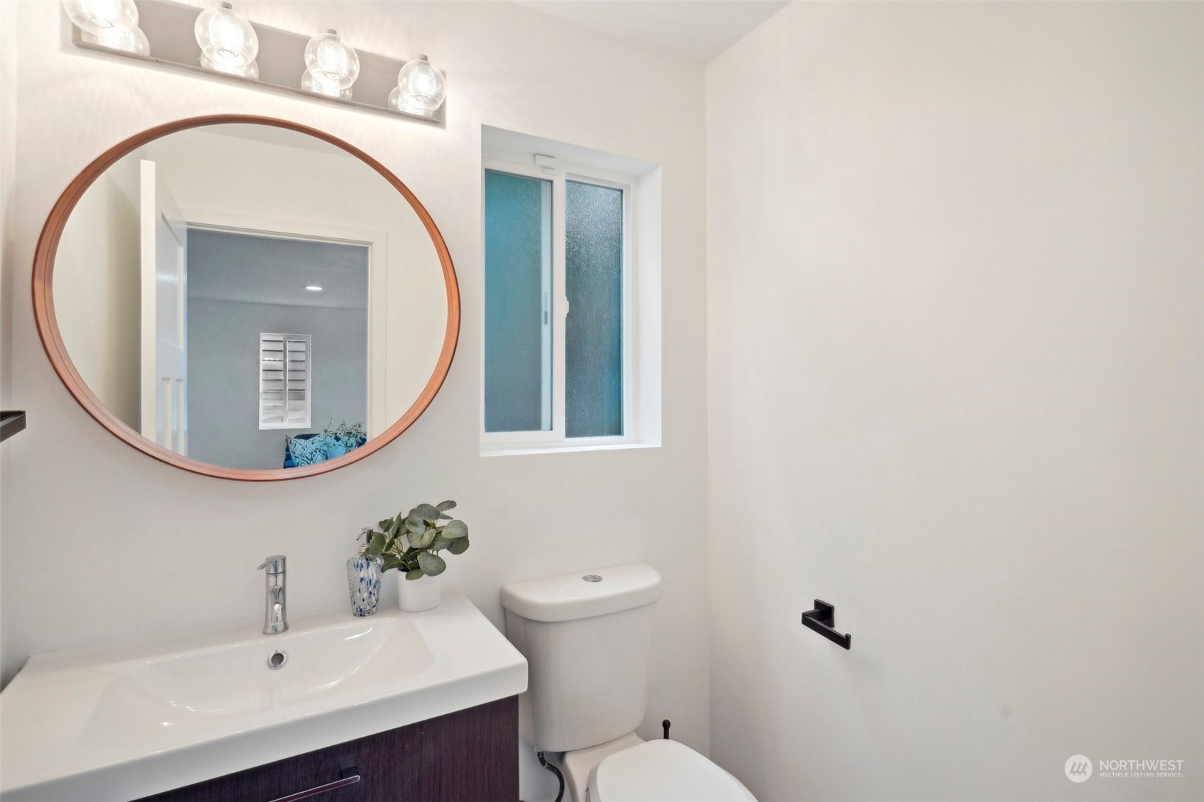 7453 Gatewood Road Southwest Seattle, WA 98136 - Photo 13 of 40 a bathroom with a sink mirror and toilet