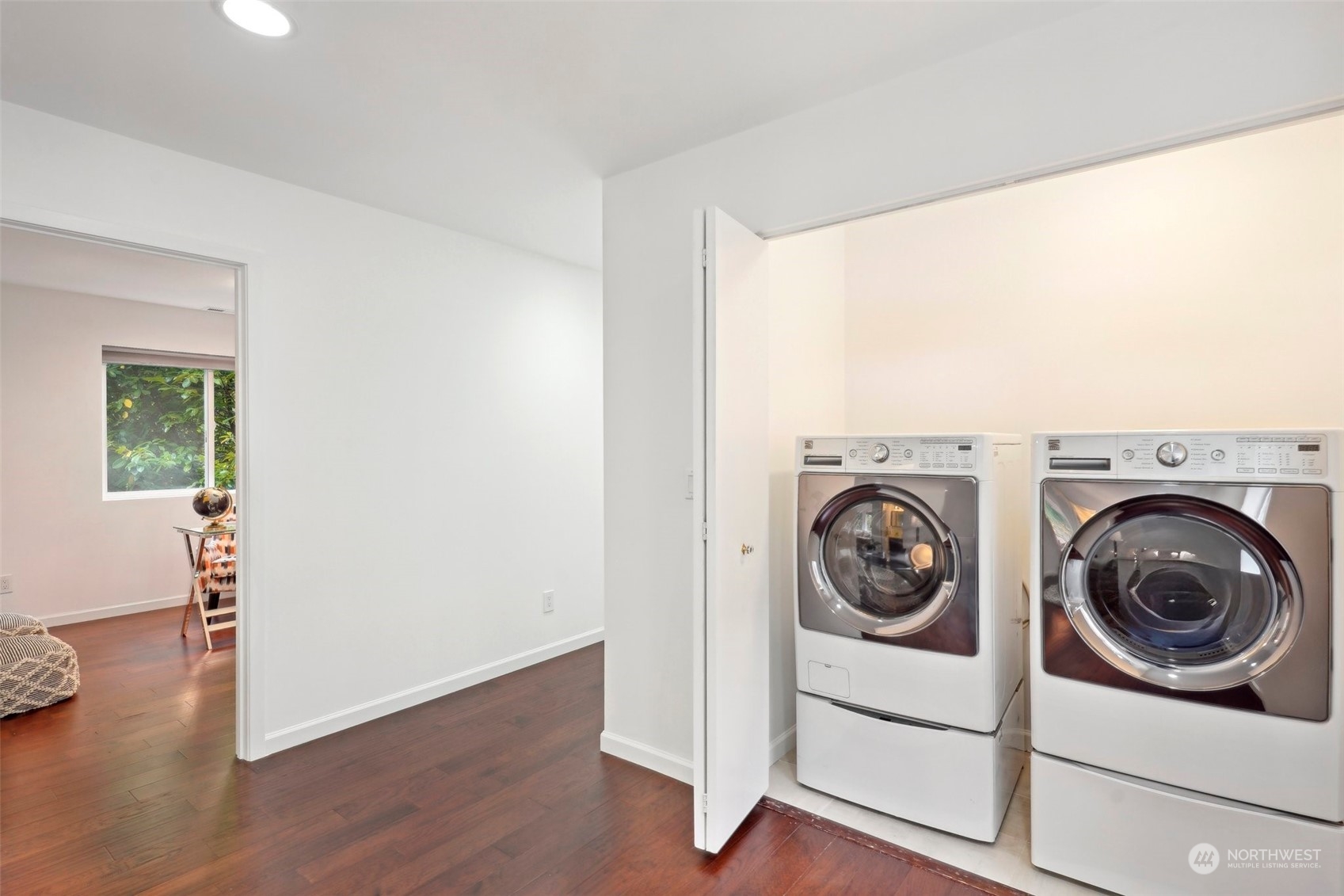 7453 Gatewood Road Southwest Seattle, WA 98136 - Photo 18 of 40 a view of washer and dryer in a utility room