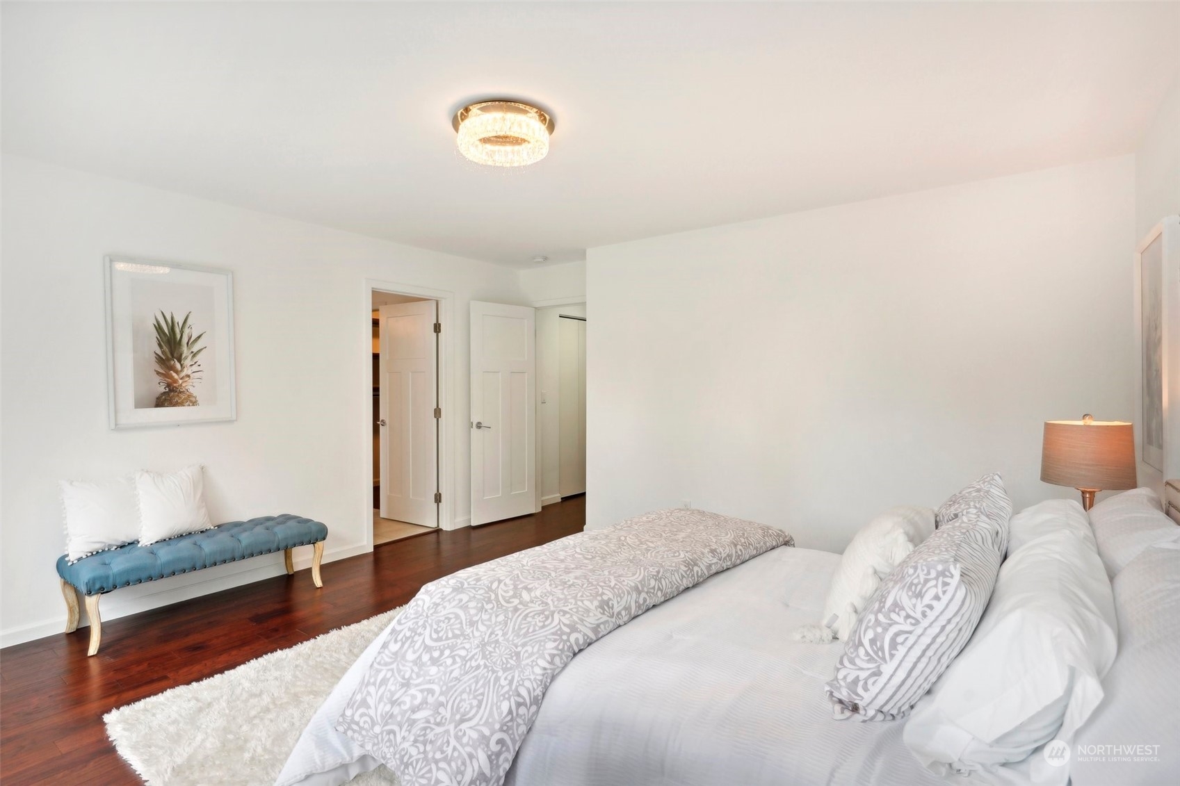 7453 Gatewood Road Southwest Seattle, WA 98136 - Photo 20 of 40 a bedroom with a bed and a couch