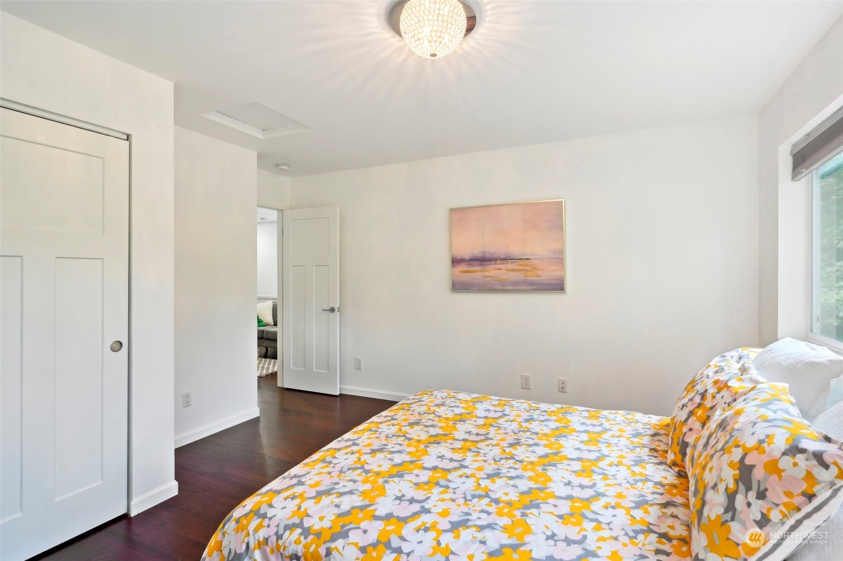 7453 Gatewood Road Southwest Seattle, WA 98136 - Photo 26 of 40 a bedroom with a bed and a painting on the wall