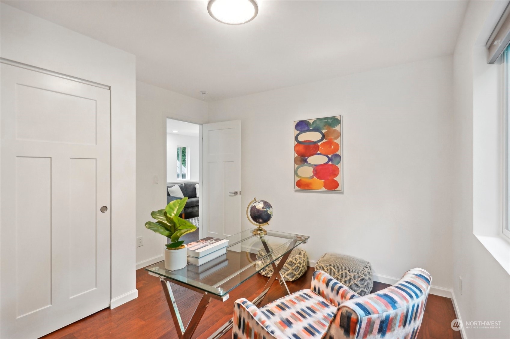 7453 Gatewood Road Southwest Seattle, WA 98136 - Photo 29 of 40 a workspace with furniture and wooden floor