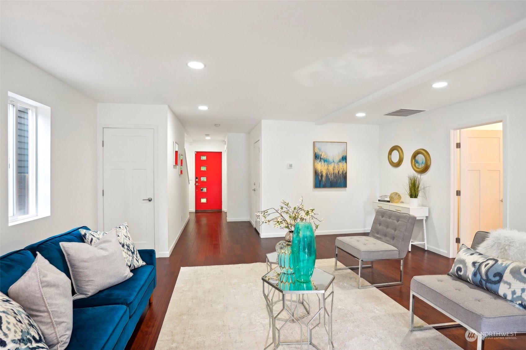 7453 Gatewood Road Southwest Seattle, WA 98136 - Photo 3 of 40 a living room with furniture and wooden floor