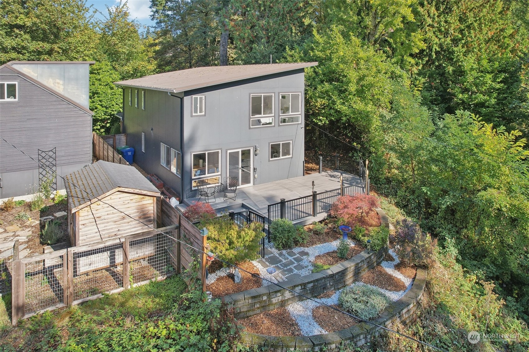 7453 Gatewood Road Southwest Seattle, WA 98136 - Photo 34 of 40 a view of a backyard with sitting area