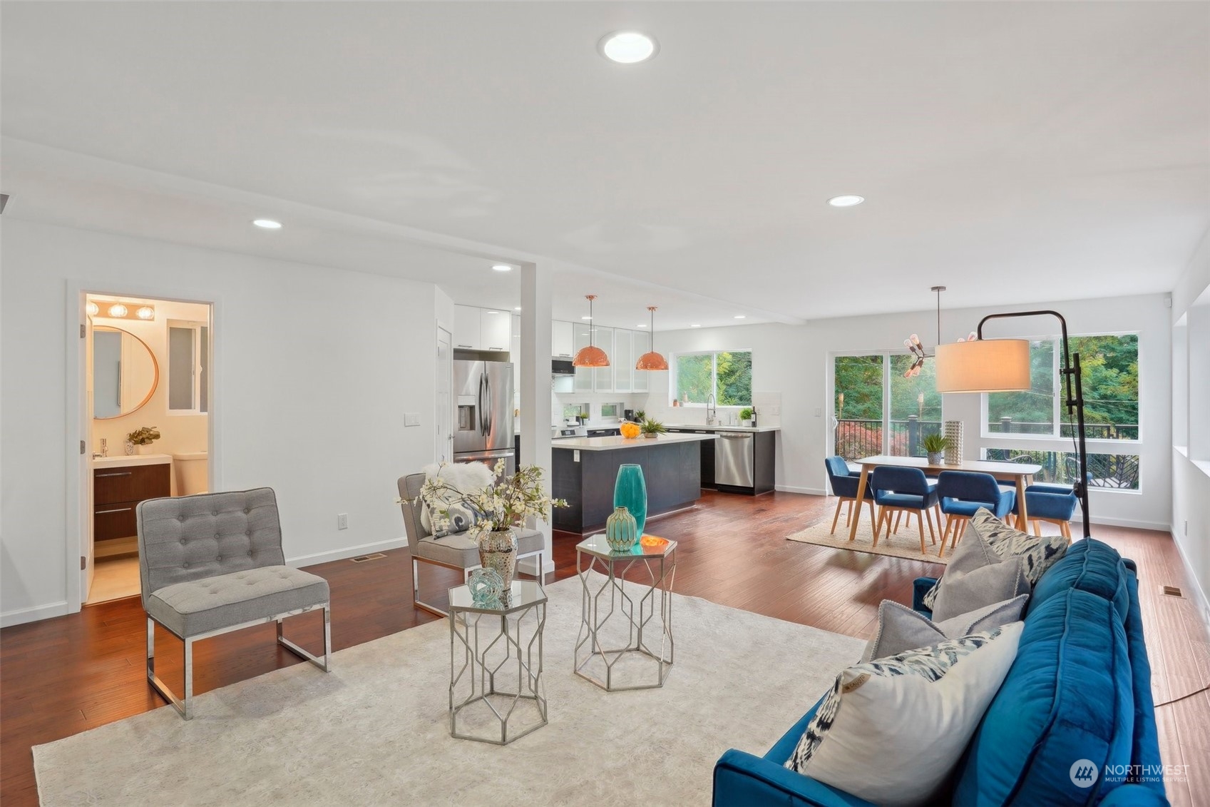 7453 Gatewood Road Southwest Seattle, WA 98136 - Photo 4 of 40 a living room with furniture and a large window