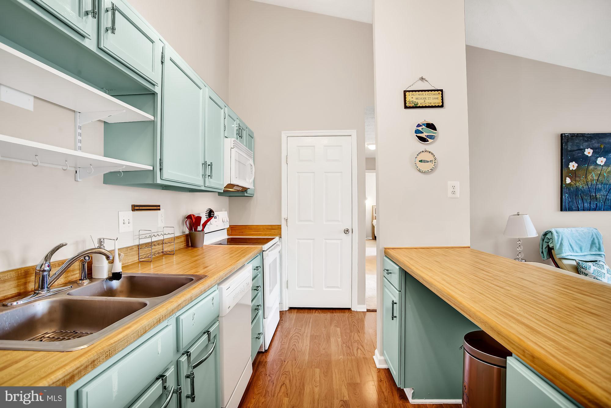 647 Deering Road, Unit 2M Pasadena, MD 21122 - Photo 4 of 25 Kitchen opens up to living room